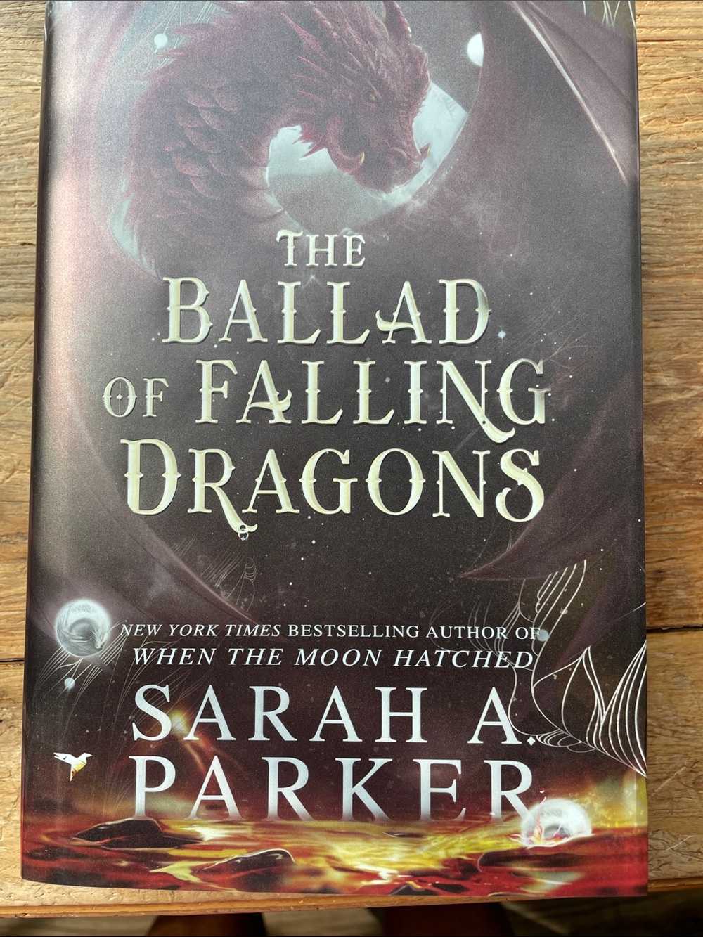 The Ballad of Falling Dragons by Sarah A. Parker - Rich Maroon Dragon Cover